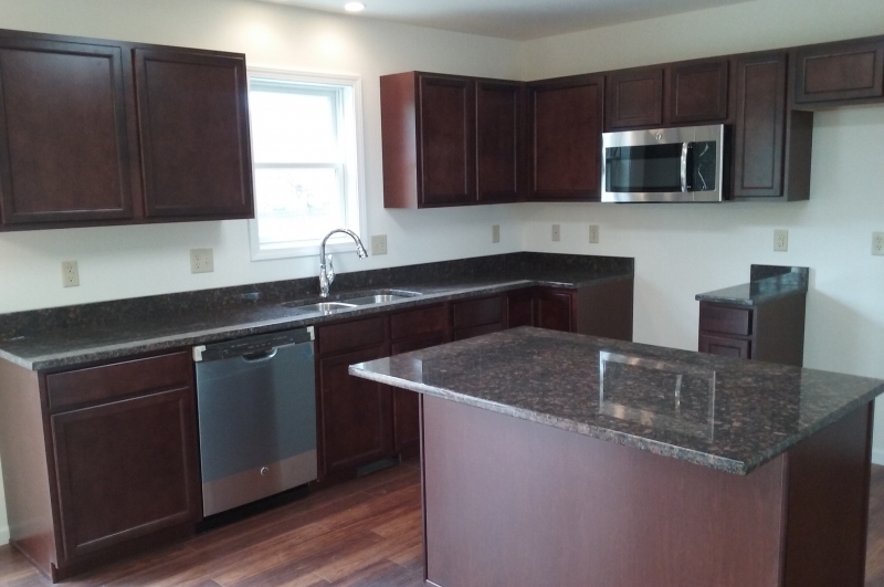 Newly installed cabinets & granite tops.